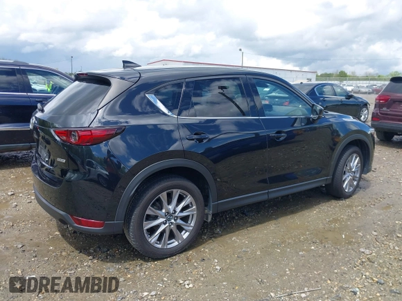 2019 Mazda CX-5 Grand Touring with VIN JM3KFBDM7K0518603, listed as a IAAI auction lot 39185478 with 42,805 mi miles. Bid and sale history available at carsss.com. Image 4.