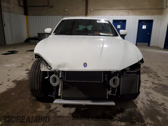2021 Maserati Levante z VIN ZN661XUA1MX370792, wystawiony jako Copart lot #83474194 z przebiegiem 89 428 mil mil oraz Szkoda całkowita • Salvage title. Historia ofert i sprzedaży dostępna na DreamBid. Obrazek 5.
