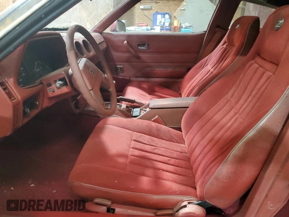 1981 Datsun 280ZX z VIN JN1HZ04S1BX414616, wystawiony jako Copart lot #82249204 z przebiegiem 114 028 mil mil oraz Tytuł czysty. Historia ofert i sprzedaży dostępna na DreamBid. Obrazek 7.