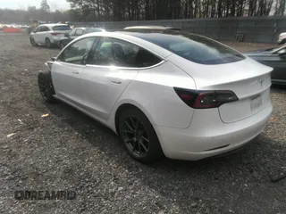 2020 Tesla Model 3 Standard Range Plus with VIN 5YJ3E1EA4LF792830, listed as a IAAI auction lot 41852919 with 76,461 mi miles. Bid and sale history available at carsss.com. Image 3.