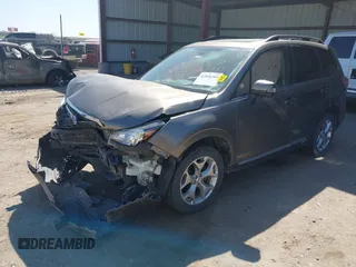 2017 Subaru Forester Touring z VIN JF2SJAWC8HH582683, wystawiony jako IAAI lot #42046369 z przebiegiem 71 070 mil mil oraz . Historia ofert i sprzedaży dostępna na DreamBid. Obrazek 16.