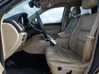 2016 Jeep Grand Cherokee Limited z VIN 1C4RJFBG2GC457581, wystawiony jako Copart lot #64200815 z przebiegiem 71 808 mil mil oraz Szkoda całkowita • Salvage title. Historia ofert i sprzedaży dostępna na DreamBid. Obrazek 7.