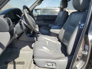 2001 Toyota Land Cruiser z VIN JTEHT05J812012460, wystawiony jako Copart lot #59053845 z przebiegiem 287 639 mil mil oraz Szkoda całkowita • Salvage title. Historia ofert i sprzedaży dostępna na DreamBid. Obrazek 7.