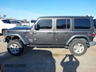2018 Jeep Wrangler Unlimited Sport S z VIN 1C4HJXDG4JW132547, wystawiony jako IAAI lot #41838010 z przebiegiem 69 987 mil mil oraz . Historia ofert i sprzedaży dostępna na DreamBid. Obrazek 14.