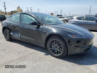 2025 Tesla Model 3 Long Range with VIN 5YJ3E1EA8SF918928, listed as a Copart auction lot 53454155 with 2,061 mi miles and Salvage title. Bid and sale history available at DreamBid. Image 4.