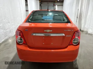 2013 Chevrolet Sonic LT with VIN 1G1JC5SB9D4220025, listed as a Copart auction lot 49413435 with 96,320 mi miles and Salvage Title. Bid and sale history available at DreamBid. Image 6.