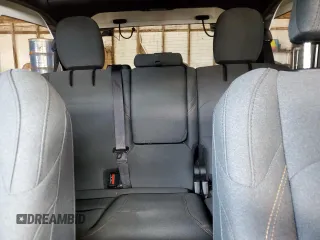 2024 Jeep Wrangler Sahara with VIN 1C4RJXP67RW223380, listed as a Copart auction lot 52192095 with 18,326 mi miles and Salvage Title. Bid and sale history available at DreamBid. Image 10.