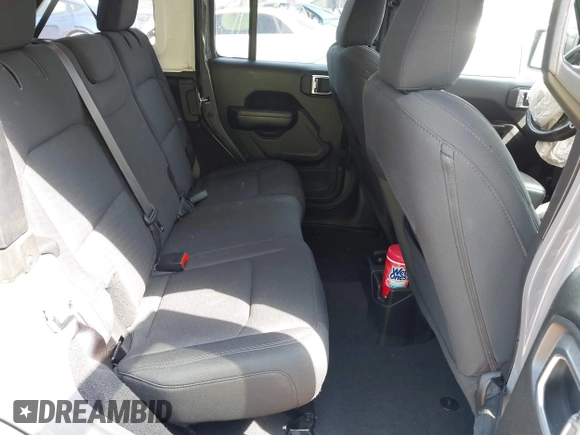 2019 Jeep Wrangler Unlimited Sport S with VIN 1C4HJXDG3KW662946, listed as a IAAI auction lot 42157025 with 26,096 mi miles and . Bid and sale history available at DreamBid. Image 8.