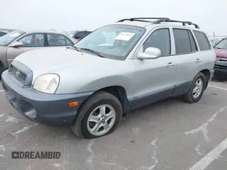 2003 Hyundai Santa Fe LX with VIN KM8SC73E83U568666, listed as a IAAI auction lot 41679044 with 127,560 mi miles. Bid and sale history available at carsss.com. Image 2.
