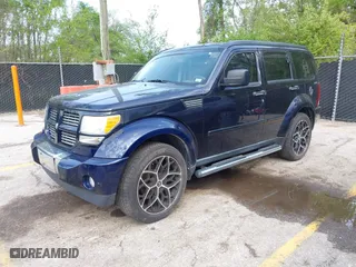 2011 Dodge Nitro Heat with VIN 1D4PU4GX2BW514237, listed as a IAAI auction lot 42109697 with 151,365 mi miles. Bid and sale history available at carsss.com. Image 2.