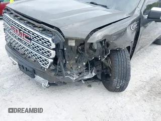 2019 GMC Sierra 1500 Denali z VIN 1GTU9FEL8KZ180128, wystawiony jako IAAI lot #42028488 z przebiegiem 78 015 mil mil oraz . Historia ofert i sprzedaży dostępna na DreamBid. Obrazek 6.
