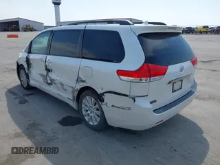 2011 Toyota Sienna XLE with VIN 5TDDK3DC6BS010355, listed as a IAAI auction lot 41998019 with 257,558 mi miles and . Bid and sale history available at DreamBid. Image 3.