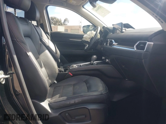 2021 Mazda CX-5 Grand Touring with VIN JM3KFBDM4M1426197, listed as a IAAI auction lot 42004644 with 43,814 mi miles. Bid and sale history available at carsss.com. Image 5.