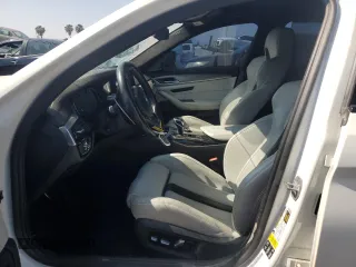 2019 BMW M5 z VIN WBSJF0C53KB284878, wystawiony jako Copart lot #59773965 z przebiegiem Nie podano mil oraz Szkoda całkowita • Salvage title. Historia ofert i sprzedaży dostępna na DreamBid. Obrazek 7.