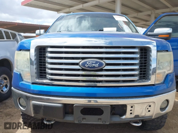 2011 Ford F-150 XL with VIN 1FTFW1EF3BFC67998, listed as a IAAI auction lot 41946766 with 185,528 mi miles. Bid and sale history available at carsss.com. Image 6.