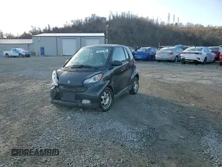 2012 Smart fortwo Pure z VIN WMEEJ3BA3CK570191, wystawiony jako Copart lot #43576165 z przebiegiem 80 511 mil mil oraz Szkody całkowita. Historia ofert i sprzedaży dostępna na DreamBid. Obrazek 13.