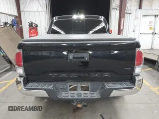 2021 Toyota Tacoma SR with VIN 3TMCZ5AN4MM448304, listed as a IAAI auction lot 42046932 with 56,161 mi miles and . Bid and sale history available at DreamBid. Image 16.