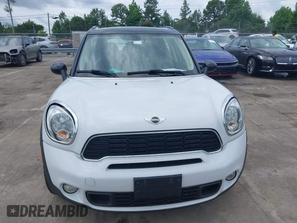2014 MINI Countryman S z VIN WMWZC5C57EWP38396, wystawiony jako IAAI lot #42400771 z przebiegiem 147 302 mil mil oraz . Historia ofert i sprzedaży dostępna na DreamBid. Obrazek 6.