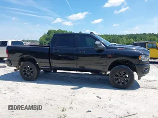 2023 Ram 2500 Big Horn with VIN 3C6UR5DL6PG504090, listed as a IAAI auction lot 42512380 with 50,231 mi miles and . Bid and sale history available at DreamBid. Image 14.
