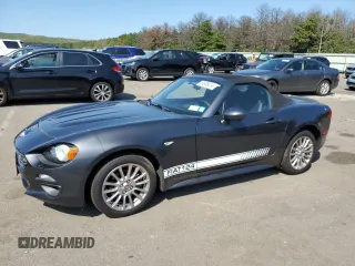 2017 FIAT 124 Spider Lusso z VIN JC1NFAEK0H0128364, wystawiony jako Copart lot #69865014 z przebiegiem 10 208 mil mil oraz Nie do naprawy. Historia ofert i sprzedaży dostępna na DreamBid. Obrazek 1.