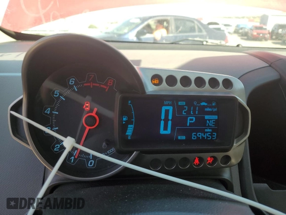 2012 Chevrolet Sonic LS z VIN 1G1JA6SH0C4113041, wystawiony jako Copart lot #58743055 z przebiegiem 69 453 mil mil oraz Szkoda całkowita • Salvage title. Historia ofert i sprzedaży dostępna na DreamBid. Obrazek 9.