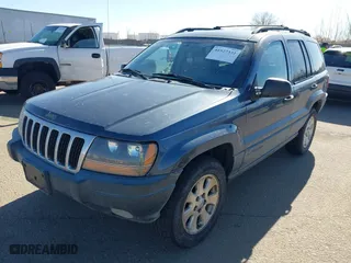 2001 Jeep Grand Cherokee Laredo with VIN 1J4GW48N11C558857, listed as a IAAI auction lot 41527331 with 187,513 mi miles. Bid and sale history available at carsss.com. Image 2.