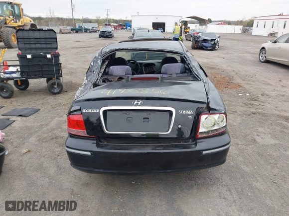 2004 Hyundai Sonata GLS with VIN KMHWF35HX4A068682, listed as a IAAI auction lot 41933856 with 127,508 mi miles. Bid and sale history available at carsss.com. Image 17.