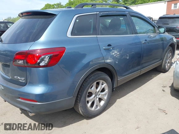 2014 Mazda CX-9 Touring with VIN JM3TB3CV8E0441535, listed as a IAAI auction lot 42355526 with 155,826 mi miles and . Bid and sale history available at DreamBid. Image 4.