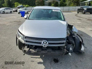2012 Volkswagen Tiguan S с VIN WVGAV7AXXCW606008, выставлен на аукционе Copart как лот 62232655 с пробегом 184 316 миль миль и Списание • Salvage title. История ставок и продаж доступна на DreamBid. Изображение 5.