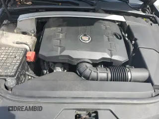 2012 Cadillac CTS Luxury z VIN 1G6DG5E51C0138233, wystawiony jako Copart lot #51972045 z przebiegiem 165 021 mil mil oraz Szkoda całkowita • Salvage title. Historia ofert i sprzedaży dostępna na DreamBid. Obrazek 13.