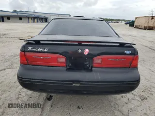 1997 Ford Thunderbird LX z VIN 1FALP62W7VH165149, wystawiony jako Copart lot #56654715 z przebiegiem 155 190 mil mil oraz Szkody całkowita. Historia ofert i sprzedaży dostępna na DreamBid. Obrazek 6.