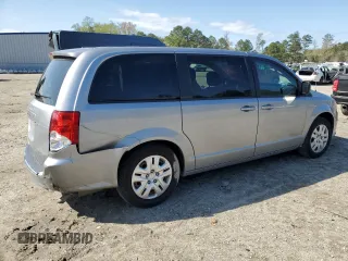 2018 Dodge Grand Caravan SE Plus with VIN 2C4RDGBG0JR136750, listed as a Copart auction lot 50957305 with 106,996 mi miles and Salvage Title. Bid and sale history available at DreamBid. Image 3.