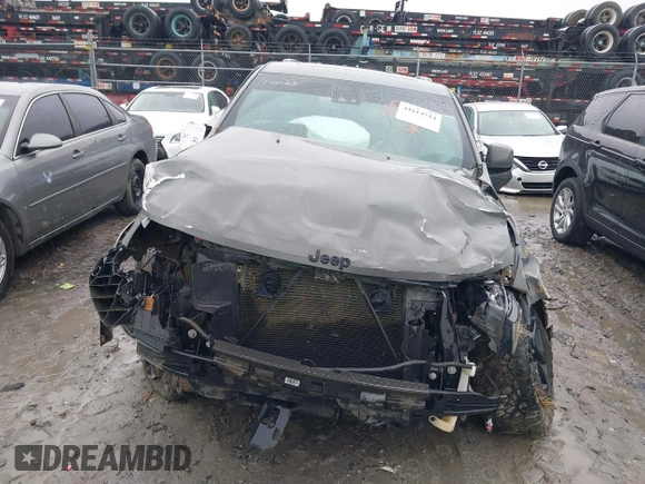 2021 Jeep Grand Cherokee Laredo X z VIN 1C4RJFAG9MC590268, wystawiony jako IAAI lot #41614514 z przebiegiem 60 933 mil mil oraz . Historia ofert i sprzedaży dostępna na DreamBid. Obrazek 13.