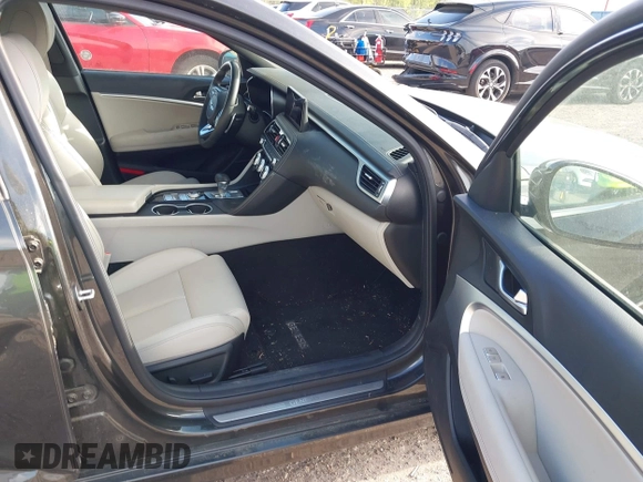 2023 Genesis G70 2.0T with VIN KMTG34TA4PU126965, listed as a IAAI auction lot 41971103 with 27,304 mi miles. Bid and sale history available at carsss.com. Image 5.