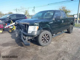 2014 Ford F-150 XL with VIN 1FTEX1CM4EKG06516, listed as a IAAI auction lot 41877641 with 202,729 mi miles. Bid and sale history available at carsss.com. Image 17.
