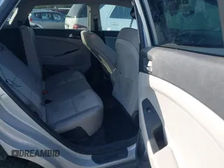 2016 Hyundai Tucson Sport with VIN KM8J33A20GU165154, listed as a IAAI auction lot 41611785 with Not Provided miles. Bid and sale history available at carsss.com. Image 8.