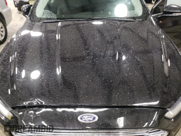 2015 Ford Fusion SE with VIN 3FA6P0HD7FR290488, listed as a Copart auction lot 58790315 with 111,435 mi miles and Salvage title. Bid and sale history available at DreamBid. Image 11.