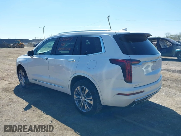 2023 Cadillac XT6 AWD Premium Luxury z VIN 1GYKPDRS4PZ182799, wystawiony jako IAAI lot #42161097 z przebiegiem 22 776 mil mil oraz . Historia ofert i sprzedaży dostępna na DreamBid. Obrazek 3.