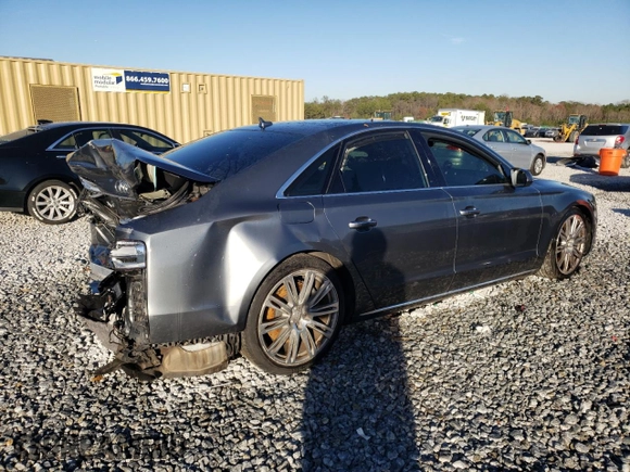 2015 Audi A8 z VIN WAUJGAFD9FN022023, wystawiony jako Copart lot #86048354 z przebiegiem Nie podano mil oraz Szkoda całkowita • Salvage title. Historia ofert i sprzedaży dostępna na DreamBid. Obrazek 3.