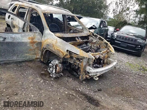 2014 Jeep Cherokee Trailhawk z VIN 1C4PJMBBXEW203063, wystawiony jako Copart lot #50887125 z przebiegiem Nie podano mil oraz Nie do naprawy • Non repairable. Historia ofert i sprzedaży dostępna na DreamBid. Obrazek 11.