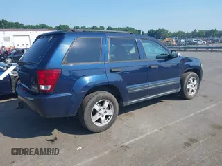 2005 Jeep Grand Cherokee Laredo with VIN 1J4HR48N45C605543, listed as a IAAI auction lot 42612473 with 158,456 mi miles and . Bid and sale history available at DreamBid. Image 4.