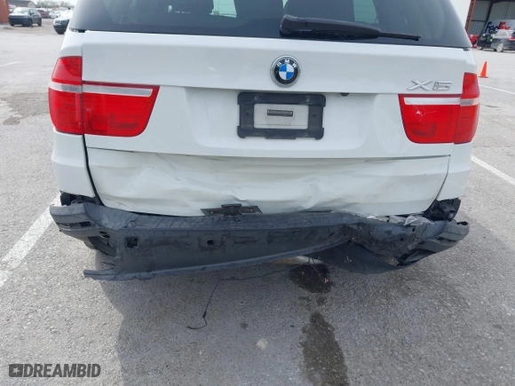 2010 BMW X5 35d with VIN 5UXFF0C52ALT75063, listed as a IAAI auction lot 41924828 with 104,513 mi miles. Bid and sale history available at carsss.com. Image 6.
