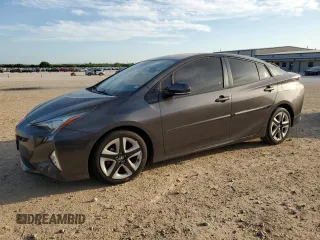 2017 Toyota Prius Two z VIN JTDKARFU1H3535384, wystawiony jako Copart lot #50787705 z przebiegiem 56 511 mil mil oraz Czysty tytuł • Clean title. Historia ofert i sprzedaży dostępna na DreamBid. Obrazek 1.