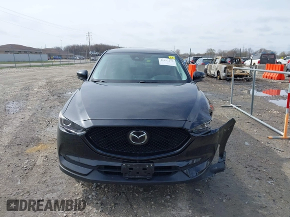 2018 Mazda CX-5 Touring with VIN JM3KFBCMXJ0438177, listed as a IAAI auction lot 42152275 with 65,434 mi miles and . Bid and sale history available at carsss.com. Image 12.