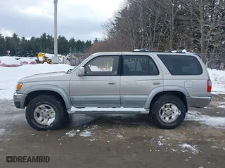 1998 Toyota 4Runner Limited with VIN JT3HN87RXW0144093, listed as a IAAI auction lot 41520901 with 205,623 mi miles. Bid and sale history available at carsss.com. Image 12.