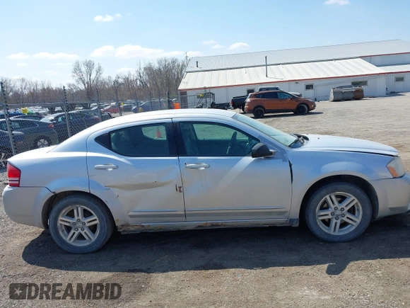 2008 Dodge Avenger SXT with VIN 1B3LC56K28N684317, listed as a IAAI auction lot 41988986 with 241,325 mi miles and . Bid and sale history available at DreamBid. Image 13.
