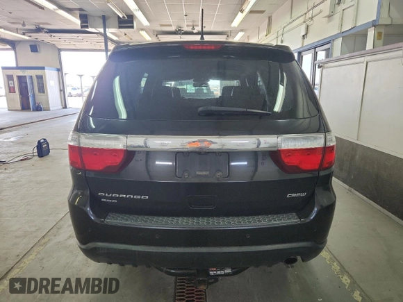 2013 Dodge Durango Crew z VIN 1C4RDJDGXDC672239, wystawiony jako Copart lot #59227905 z przebiegiem 167 982 mil mil oraz Szkoda całkowita • Salvage title. Historia ofert i sprzedaży dostępna na DreamBid. Obrazek 6.