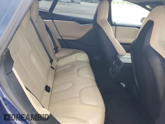 2016 Tesla Model S 90D z VIN 5YJSA1E20GF160834, wystawiony jako Copart lot #61898505 z przebiegiem 131 153 mil mil oraz Szkoda całkowita • Salvage title. Historia ofert i sprzedaży dostępna na DreamBid. Obrazek 10.