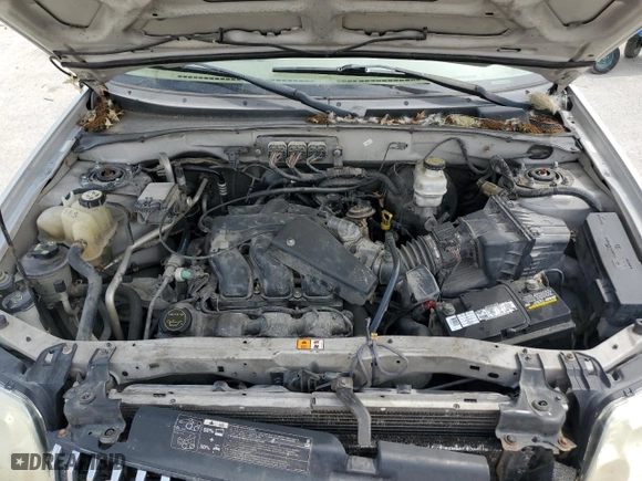 2007 Mercury Mariner Luxury with VIN 4M2YU91117KJ17436, listed as a Copart auction lot 68619844 with 249,918 mi miles and Salvage Title. Bid and sale history available at carsss.com. Image 13.