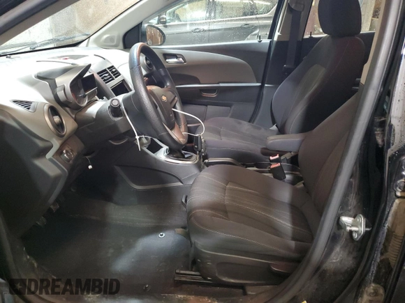 2012 Chevrolet Sonic LT z VIN 1G1JD5SH2C4148200, wystawiony jako Copart lot #74896064 z przebiegiem 104 692 mil mil oraz Szkoda całkowita • Salvage title. Historia ofert i sprzedaży dostępna na DreamBid. Obrazek 7.